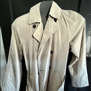 Tan raincoat size M never worn